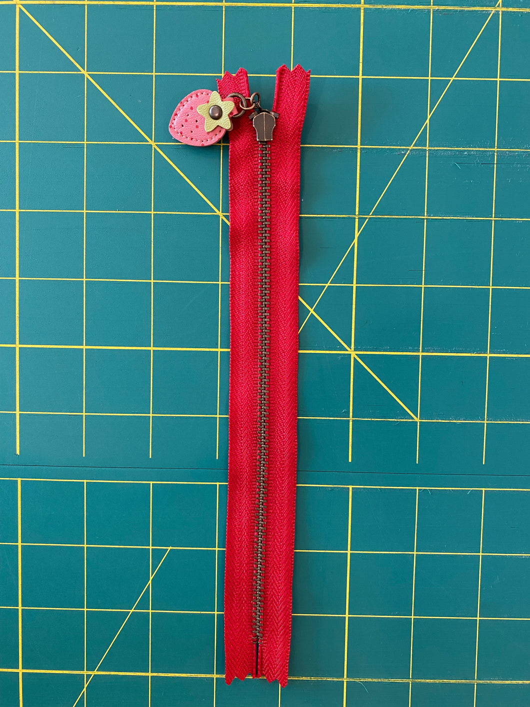 Red Zipper w/Strawberry Charm 8”
