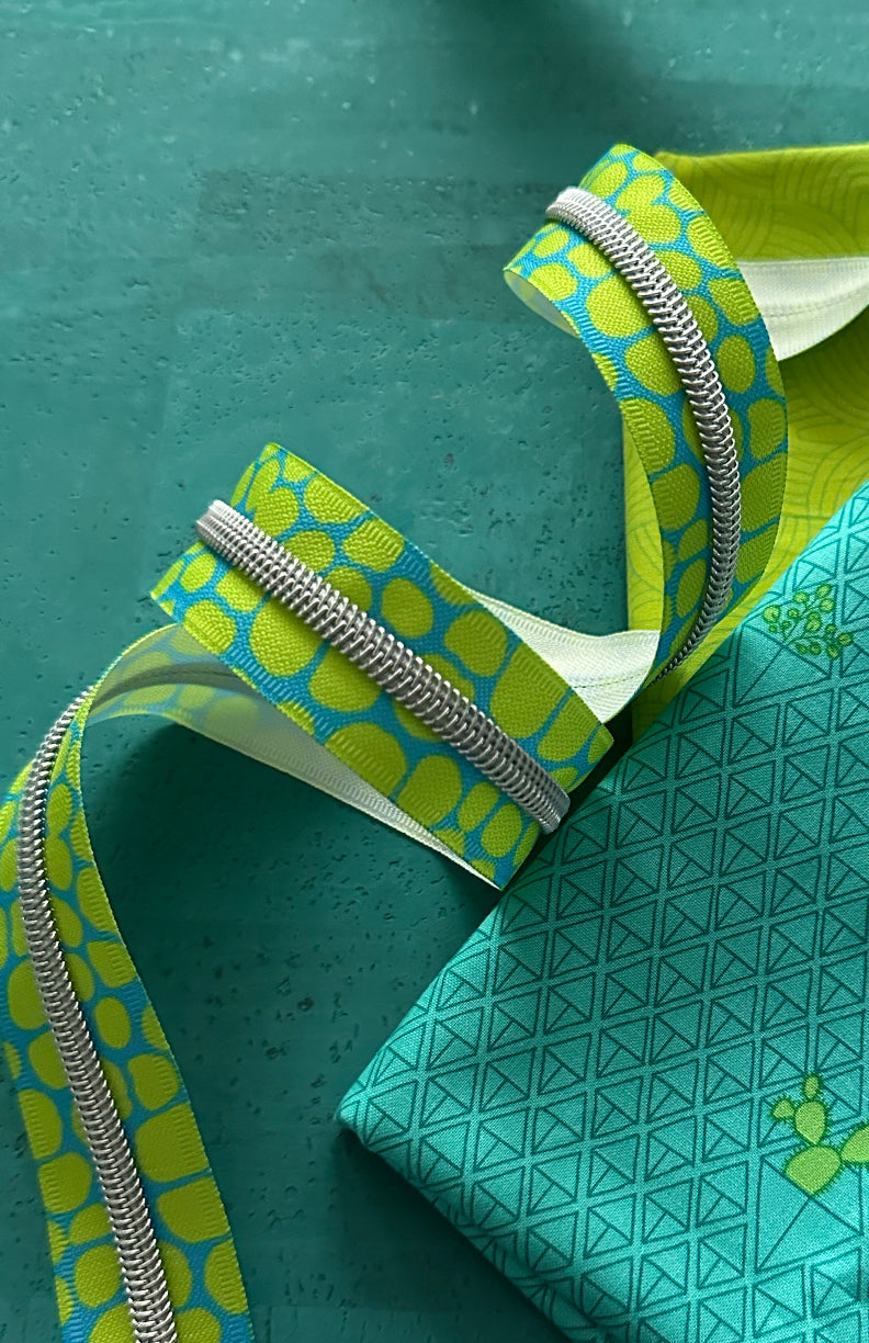 Lime Pebble on Turqoise Zipper Tape (3yd)